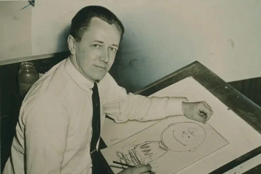 Schulz drawing in the 1950s. Roger Higgins/World Telegram & Sun via Library of Congress